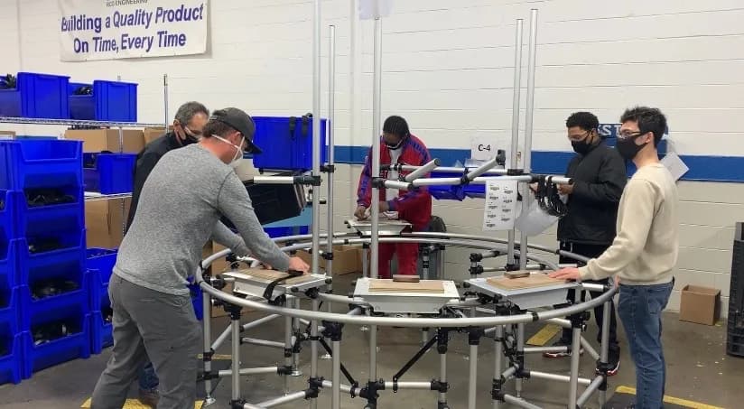 A production floor crew works on a manufacturing pivot captured for the GR Strong documentary